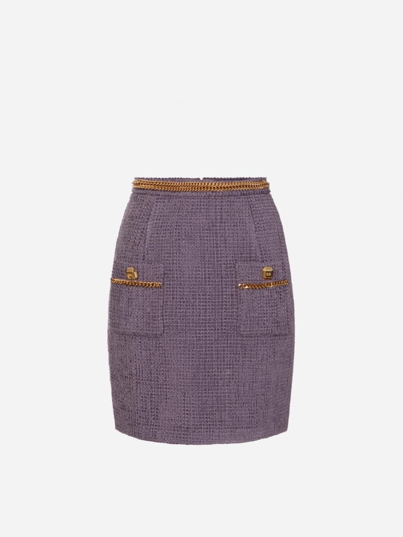 Tweed miniskirt with chain
