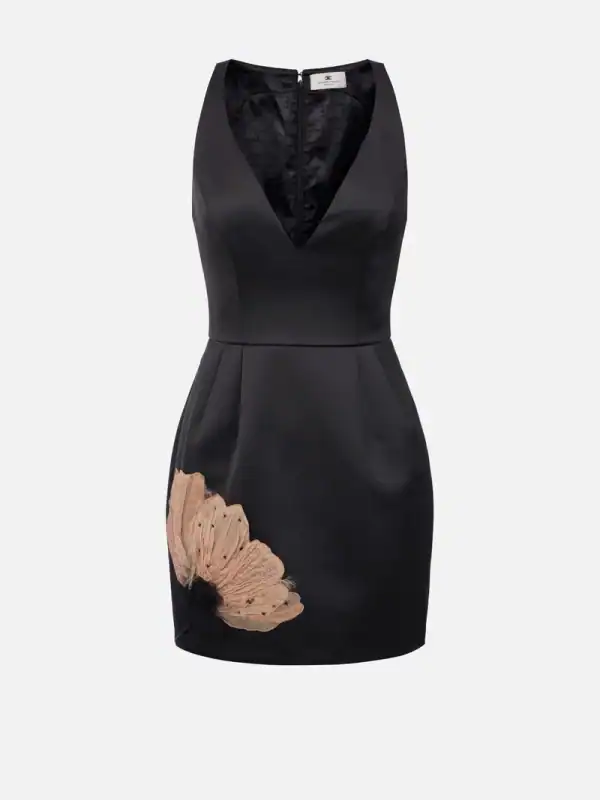 Dress in duchesse satin with embroidered flower