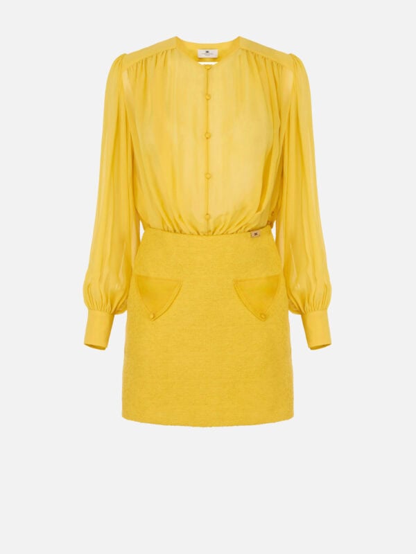 Dress in georgette and bouclé tweed fabrics