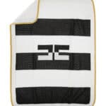 COPERTA IN MAGLIA RIGATA CON DOPPIA